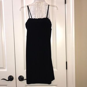 Black velvet spaghetti strap cocktail dress.